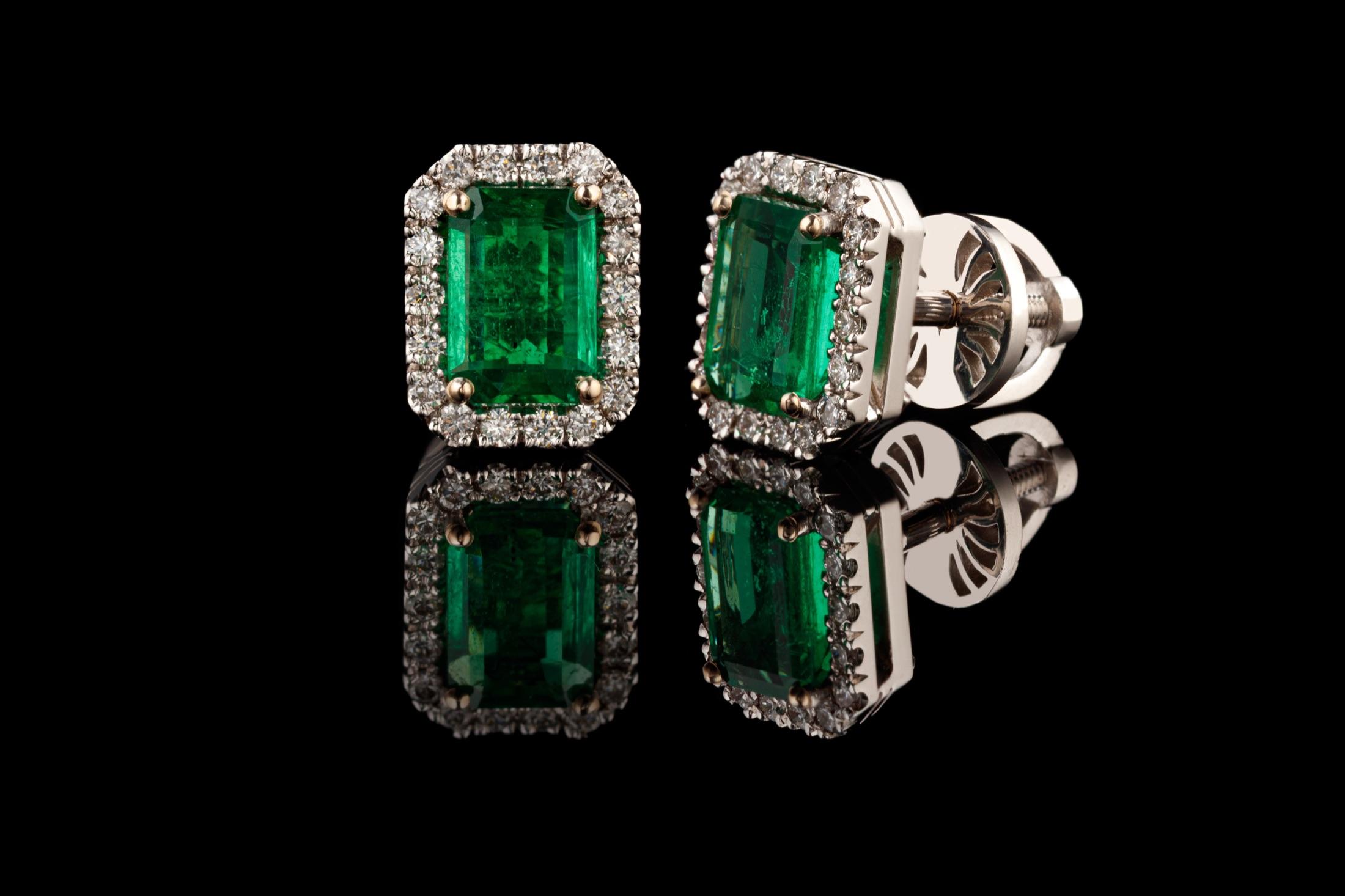 Emerald stud earrings with diamond halo, shown as jewelry inspiration