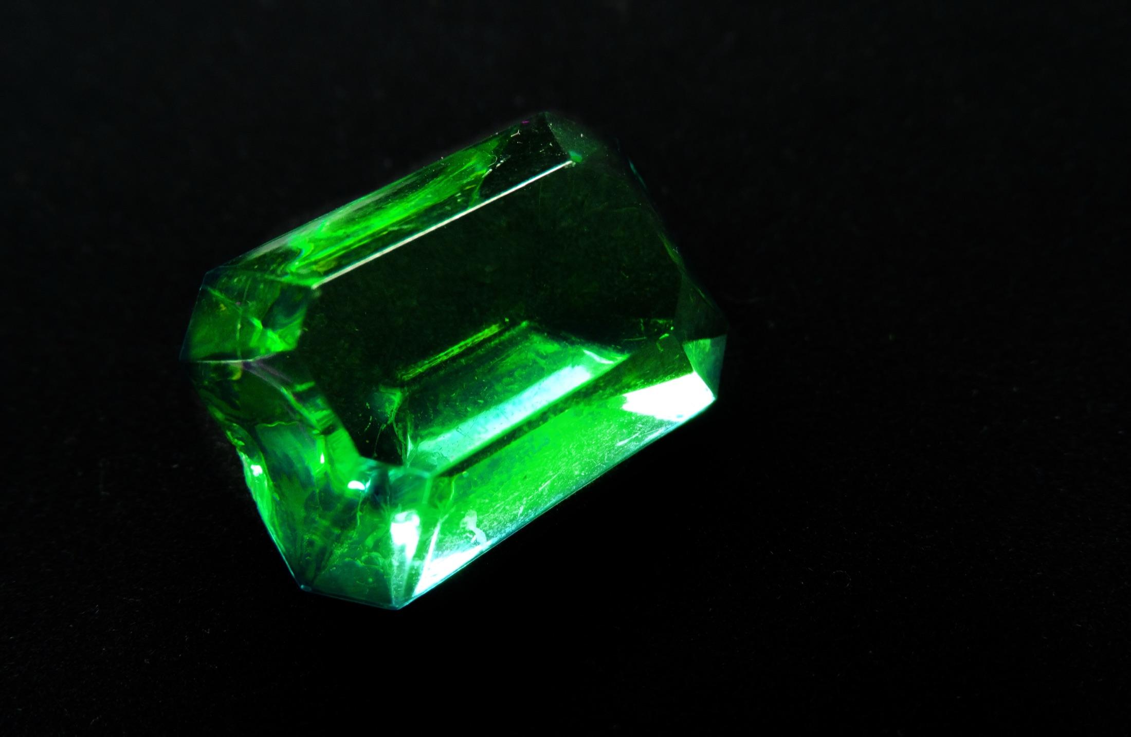 Natural Colombian emerald crystal on a dark background