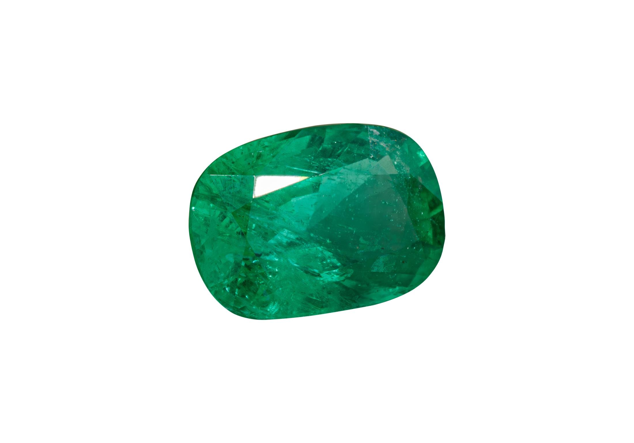 Emerald-cut Colombian emerald on a light background