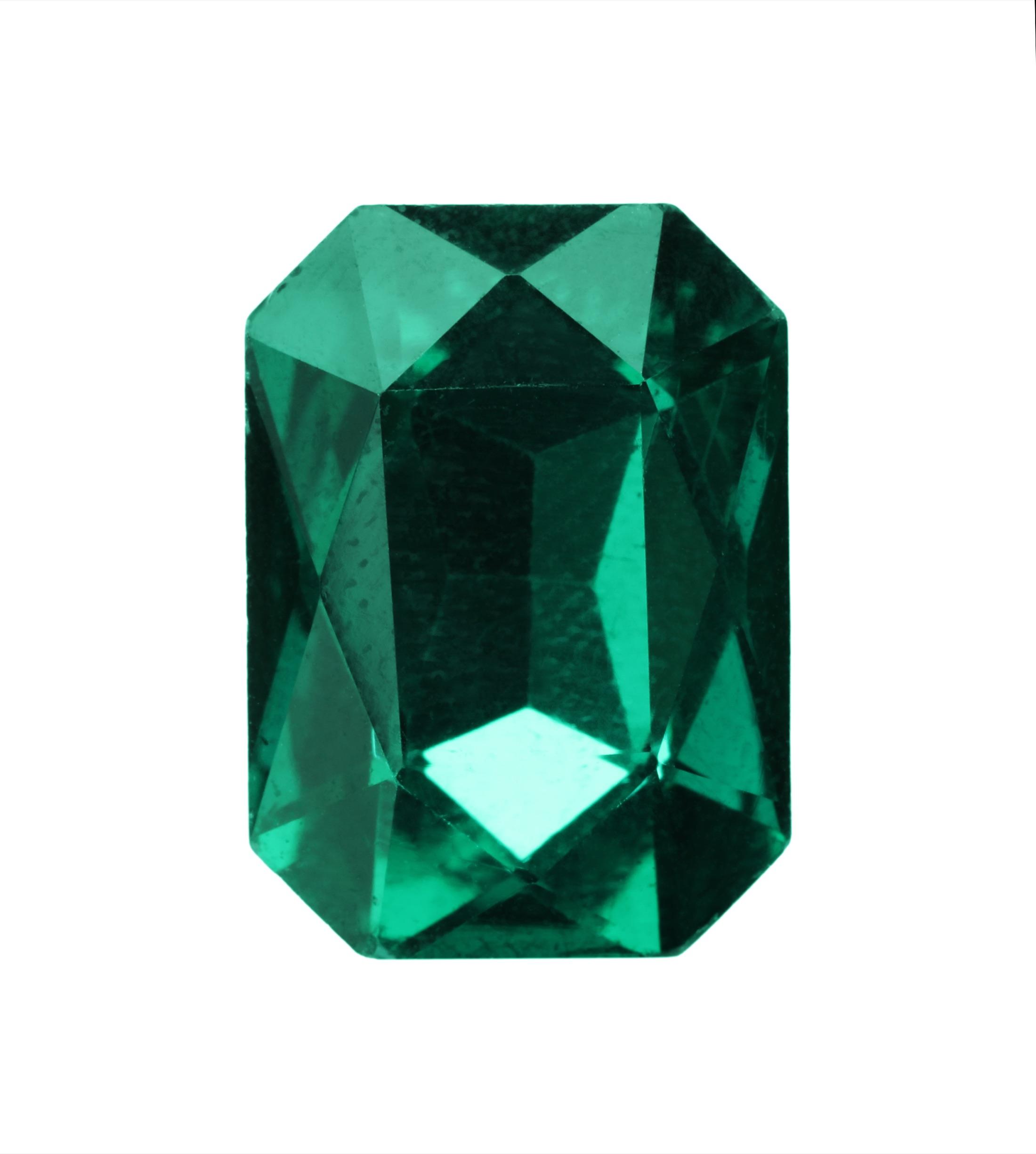 Close-up detail of a natural emerald showing internal texture